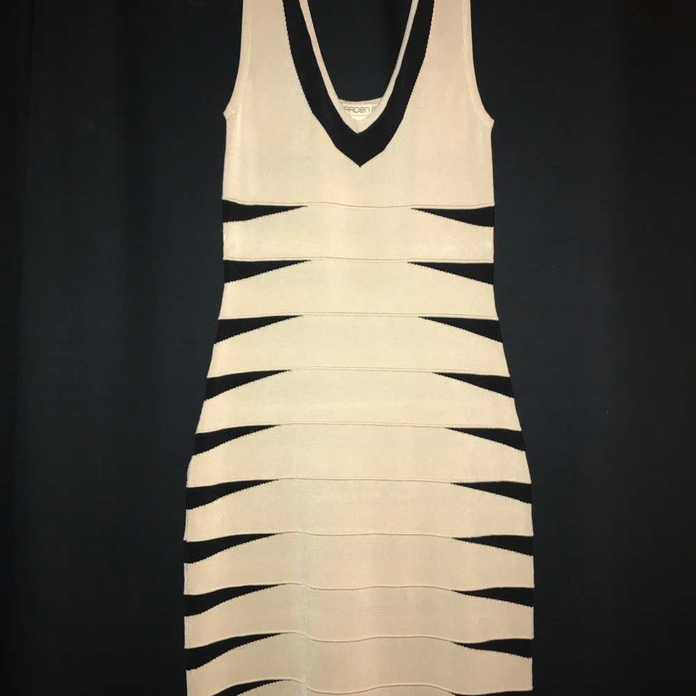 Cream colored with Black stripes down the back